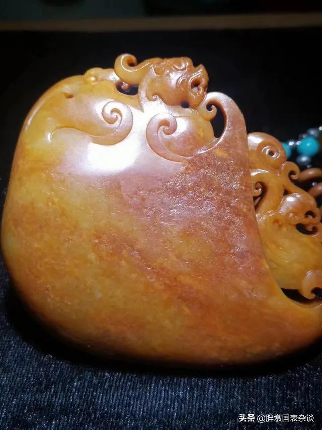 图中的和田玉的摆件价值如何?
